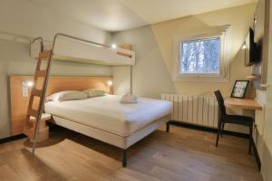 a bedroom with a bunk bed and a desk at Hotel ibis budget Aix Les Bains - Grésy in Grésy-sur-Aix +111 photos
