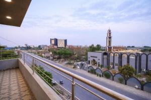 a view of a city from a bridge over a highway at Private 2BD Apartment Opposite Dha Phase 8 in Lahore
