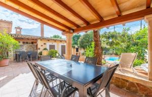 an outdoor patio with a table and chairs at Los Abilios in Palma de Mallorca