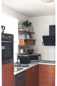 a kitchen with a sink and a stove top oven at A&M Cavtat, sunset 3 bedrooms apartment with parking in Cavtat