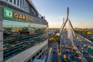a view of a bridge over a highway with traffic at Boston Condo With FREE Parking in Boston +7 photos