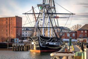 a large boat is docked in a harbor at Boston Condo With FREE Parking in Boston