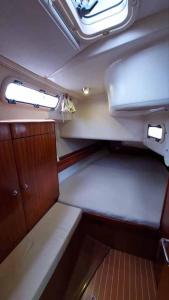 an empty room in a boat with a window at Veronica in Lefkada