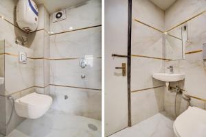 a bathroom with a toilet sink and a shower at Istay By A1Rooms in Jāmb