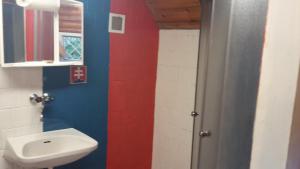 a bathroom with a toilet and a sink at Chata Katarina in Lipany