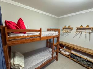 a bedroom with two bunk beds in a room at Casa Dos Papagaios in Bonito +43 photos