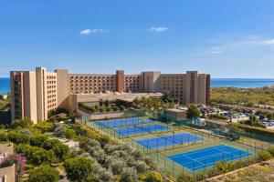 an overhead view of tennis courts at a resort at Concorde Luxury Resort & Casino in Vokolidha