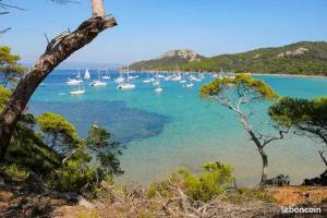 a view of a harbor with boats in the water at Chez Christine et Marcel in Nans-les-Pins
