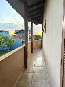 a view from the balcony of a house at Apto na Praia do Cassino in Rio Grande