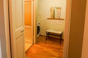 a hallway with a mirror and a table in a room at La terrazza nel tempo in Fiuggi +28 photos