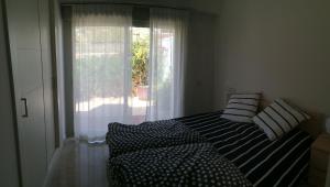 A bed or beds in a room at Villa Golf Las Colinas Még 37 kép
