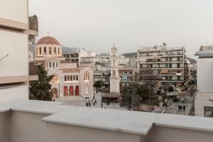 a view of a city from a building at Ermou Residences in Volos