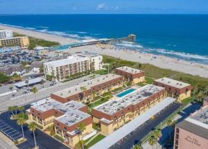 an aerial view of a resort and the beach at Condo By The Sea! in Cocoa Beach