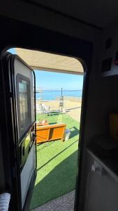 a view of the beach from the inside of a vehicle at Happy dreams in Ramlah