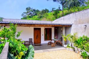 a view of a house with a patio at Greenland Villa Ella in Ella