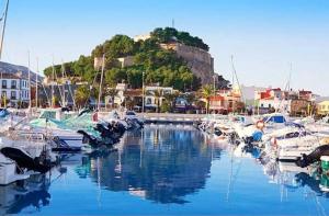 a bunch of boats are docked in a marina at La Vida Bonita in El Verger