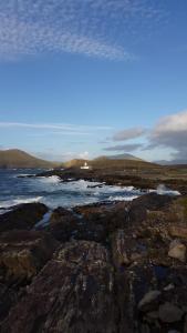 a view of a rocky beach with the ocean at Horizon View Lodge Bed and Breakfast Glanleam Road Knightstown Valentia Island County Kerry V23 W447 Ireland in Valentia Island