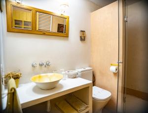 a bathroom with a sink and a toilet at Casa de Tintas in Cuenca +44 photos