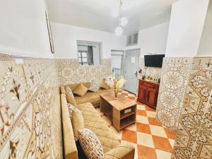 a living room with a couch and a table at Apartment with 2 bedrooms in Essaouira