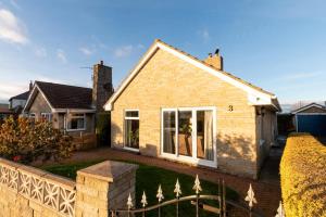 a house with a fence in front of it at 2 Bed in Staithes oc-wa071 in Staithes