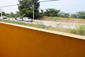 a view of a freeway with cars on the road at Srinivasam service apartment in Madurai