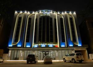 a building with cars parked in front of it at لمحة للشقق المخدومة in Riyadh