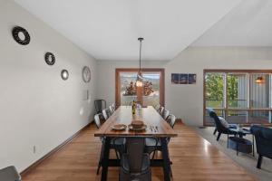 a dining room with a table and chairs at Three Lakes Haven - Pacific Retreats in Manson +24 photos