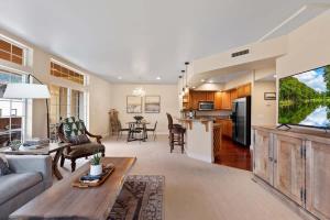 a living room with a couch and a table at Apres Ski Chalet - Pacific Retreats in Leavenworth
