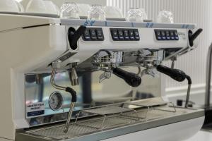 a machine sitting on top of a counter at لمحة للشقق المخدومة in Riyadh