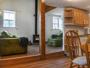 a living room with a couch and a table at 3 Bed in Barden oc-s33752 in Sabden +19 photos