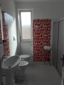 Ett badrum på Villa Raffaella