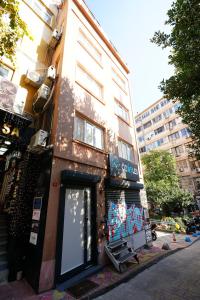 a building with graffiti on the side of it at The Apartment Galata in Istanbul