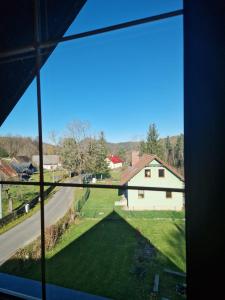 a view from a window of a house at Schronisko Sokoliki in Mysłakowice