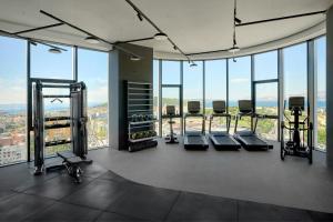 a gym with a view of the city at AC Hotel by Marriott Split in Split