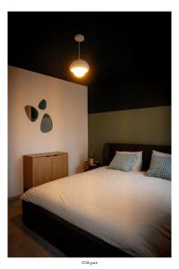 เตียงในห้องที่ La cachoire +2 ภาพ