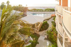 an aerial view of a resort with a swimming pool at Beach House Suites by the Don CeSar in St. Pete Beach