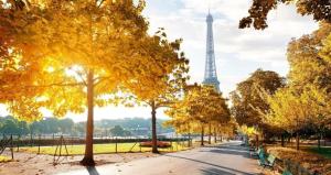 a park with the eiffel tower in the background at Le Matin bohème Paris- Orly- By Chozen in Épinay-sur-Orge