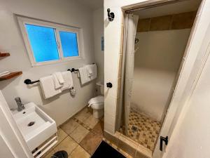 a bathroom with a shower and a sink and a toilet at The Chalet at Kings Beach Unit 6 in Kings Beach