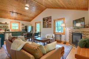 a living room with a couch and a fireplace at Havenwood in Logan