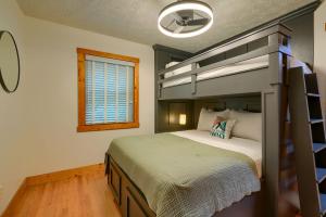 a bedroom with a bunk bed and a window at Havenwood in Logan +31 photos
