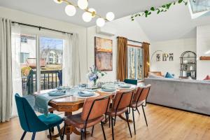 a dining room with a table and chairs at Cozy Pocono Retreat in Tobyhanna