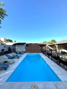 a swimming pool on the roof of a building at Etel in San Rafael