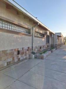 a building with a sidewalk in front of it at Etel in San Rafael