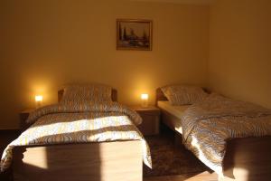 Posteľ alebo postele v izbe v ubytovaní Apartament Aldi