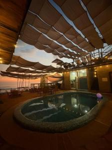 Kolam renang di atau dekat dengan HOTEL EXTASIS ZIPOLITE nudista en zona de fiesta +10 gambar