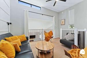 a living room with a couch and a table at #LazyBear Tahoe Dreamy Escape in Tahoe Vista