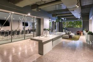an office with a reception desk and a waiting room at lyf on Elizabeth Melbourne in Melbourne