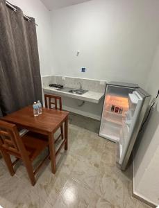 Hotel AF 7 tesisinde mutfak veya mini mutfak