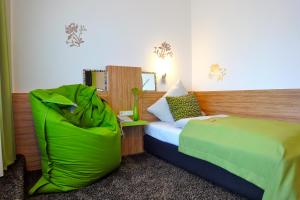 Hotel Scheidberg tesisinde bir odada yatak veya yataklar