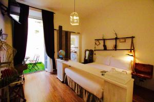Posteľ alebo postele v izbe v ubytovaní Jacuzzi Rooms